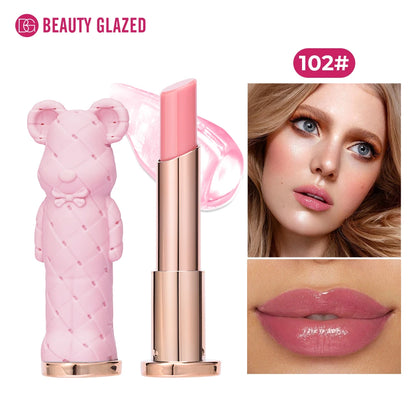 Pink lipstick with bear design and model wearing the color, branded 'Beauty Glazed'.